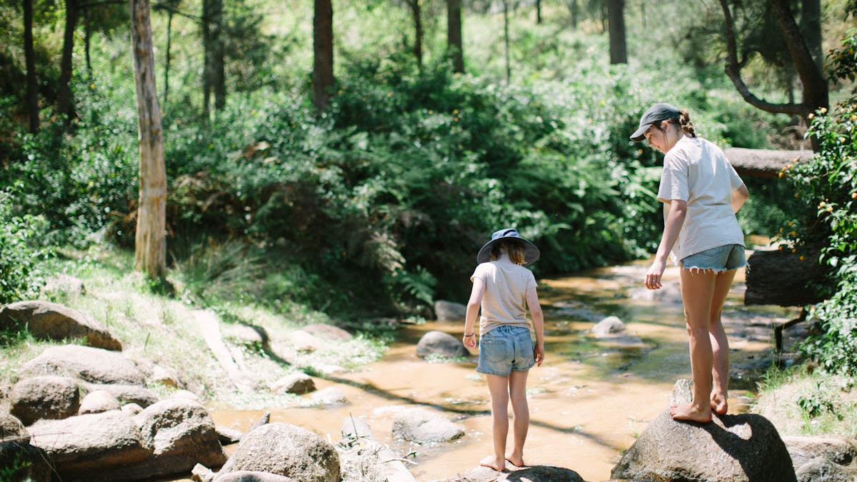 Children playing in the creek at Kimbala Country Escape