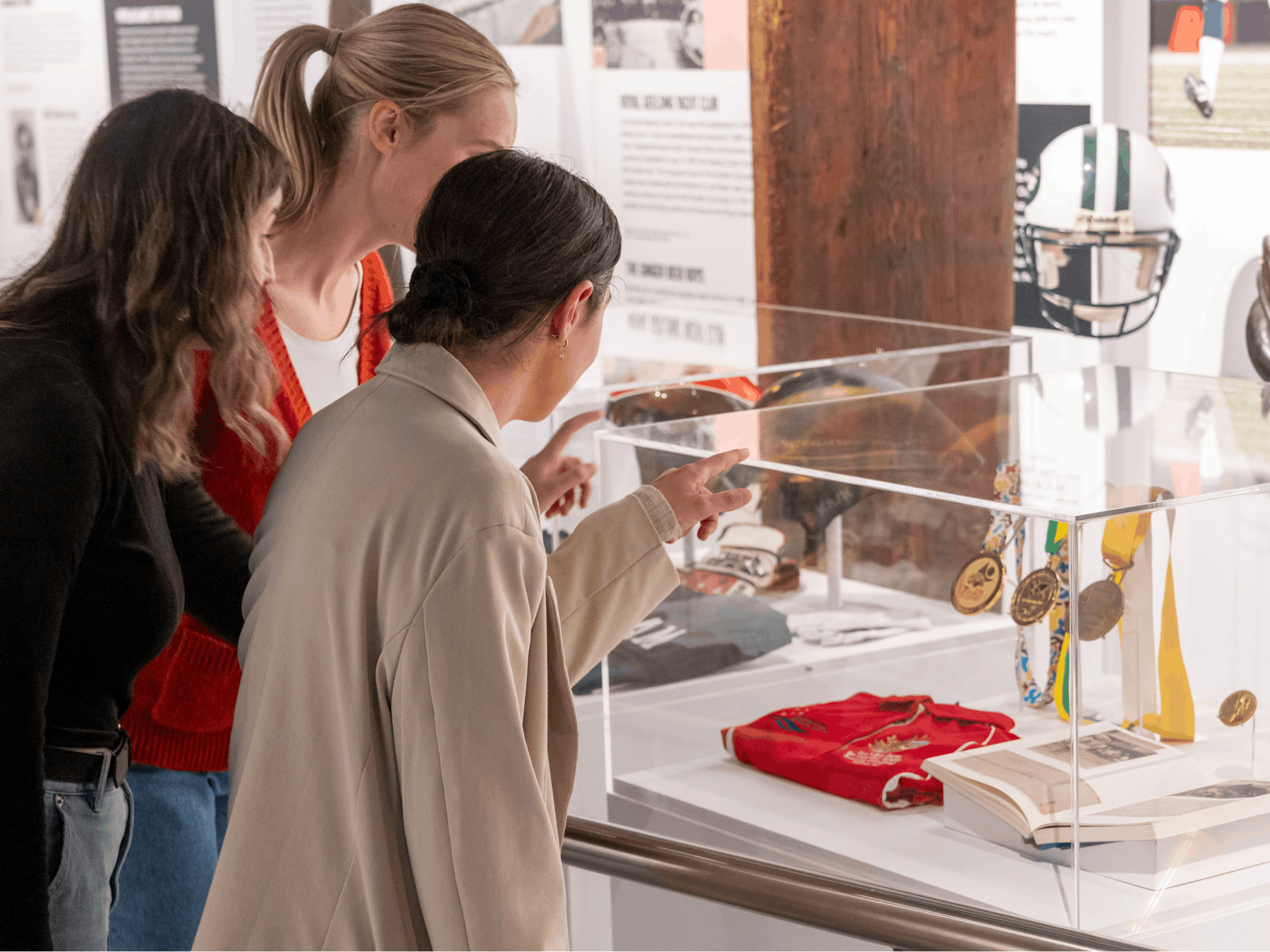 Friends looking at artifacts