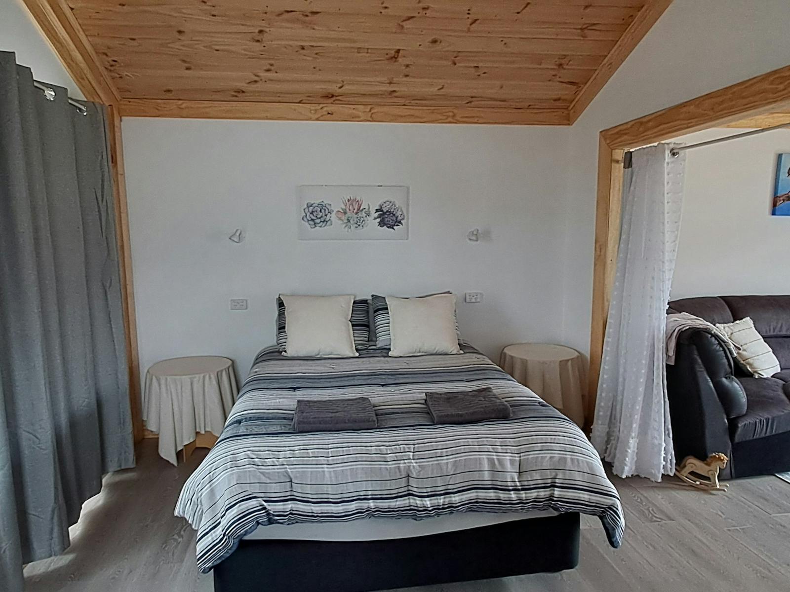 This photo is taken from where the bathroom entrance is. Bedroom 1 being identical space