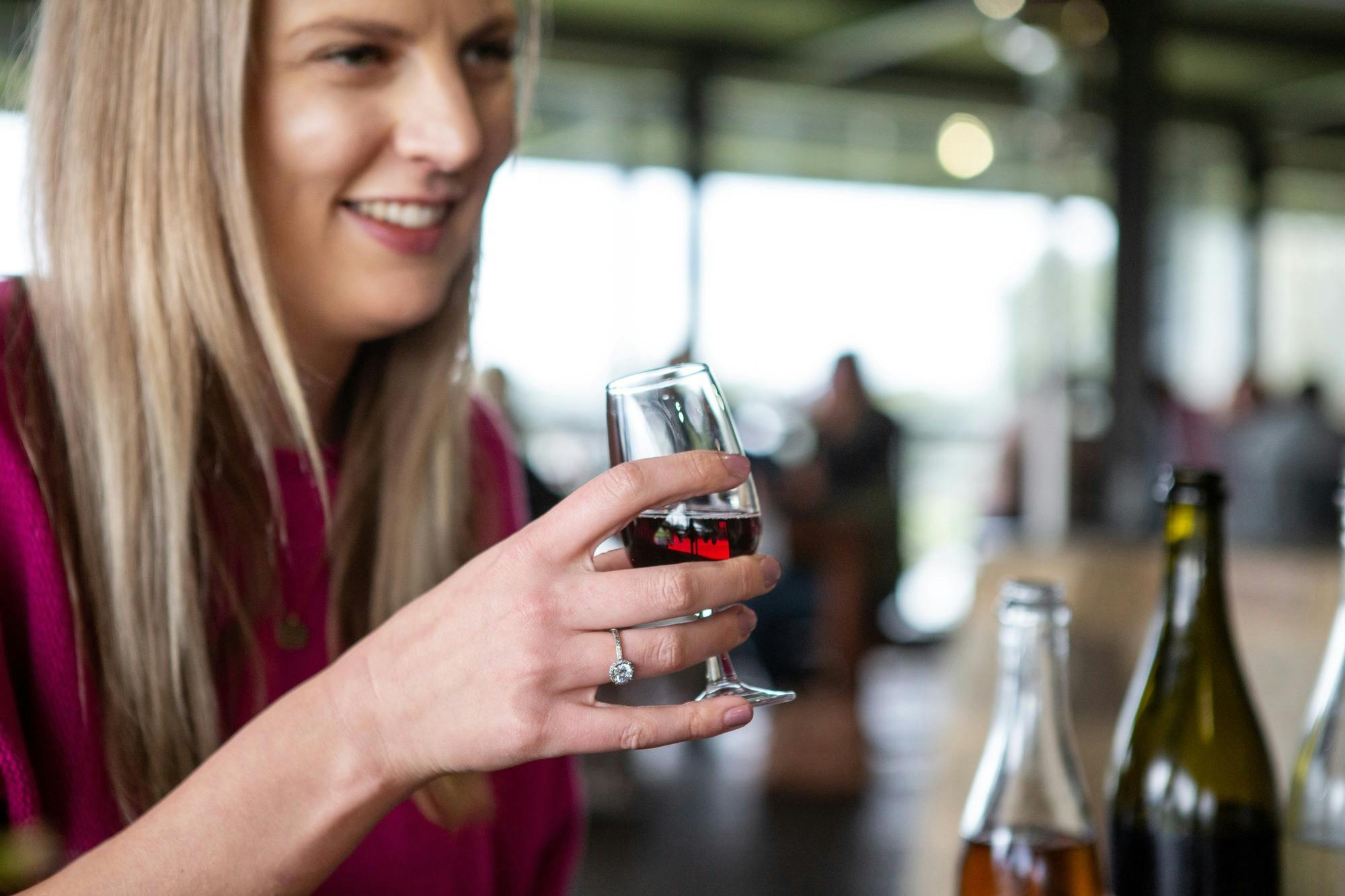 Guest enjoying a wine tasting on Cellar Door Deck