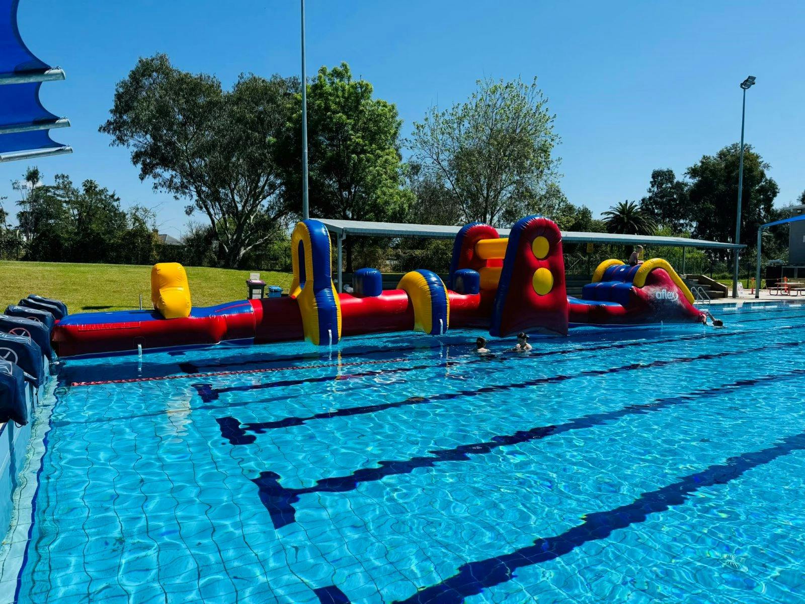 Denman Aquatic Centre - Inflatable Obstacle Course in Outdoor Pool