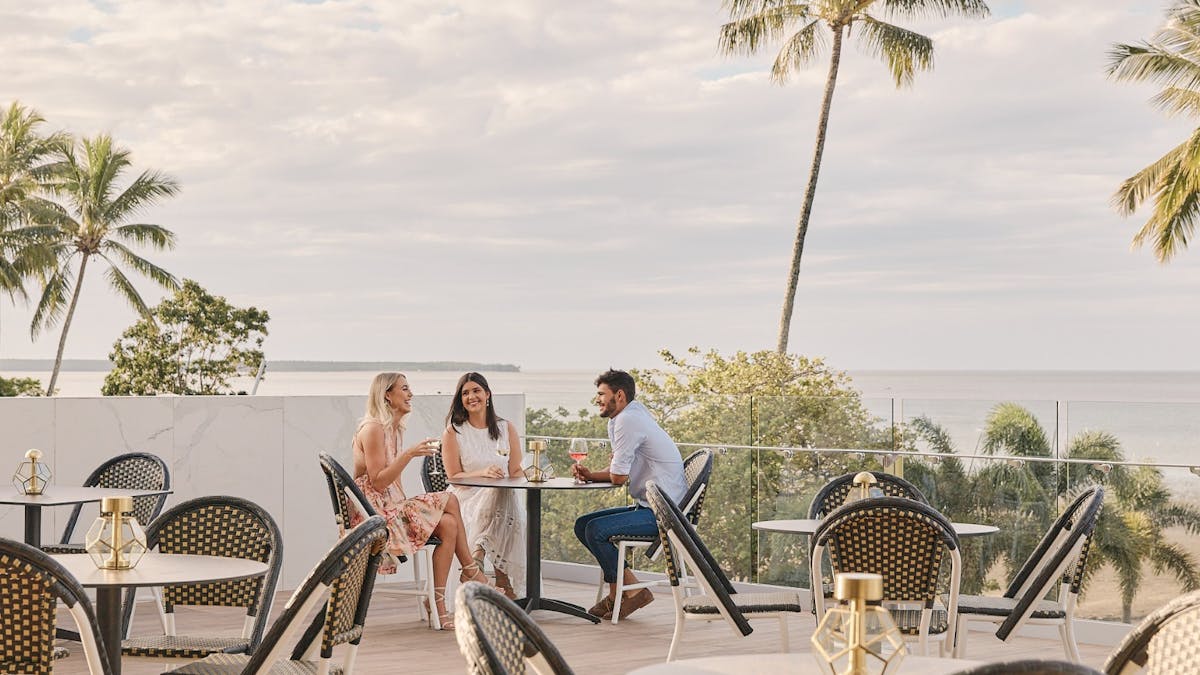 Balcony with tables and nice view in the background