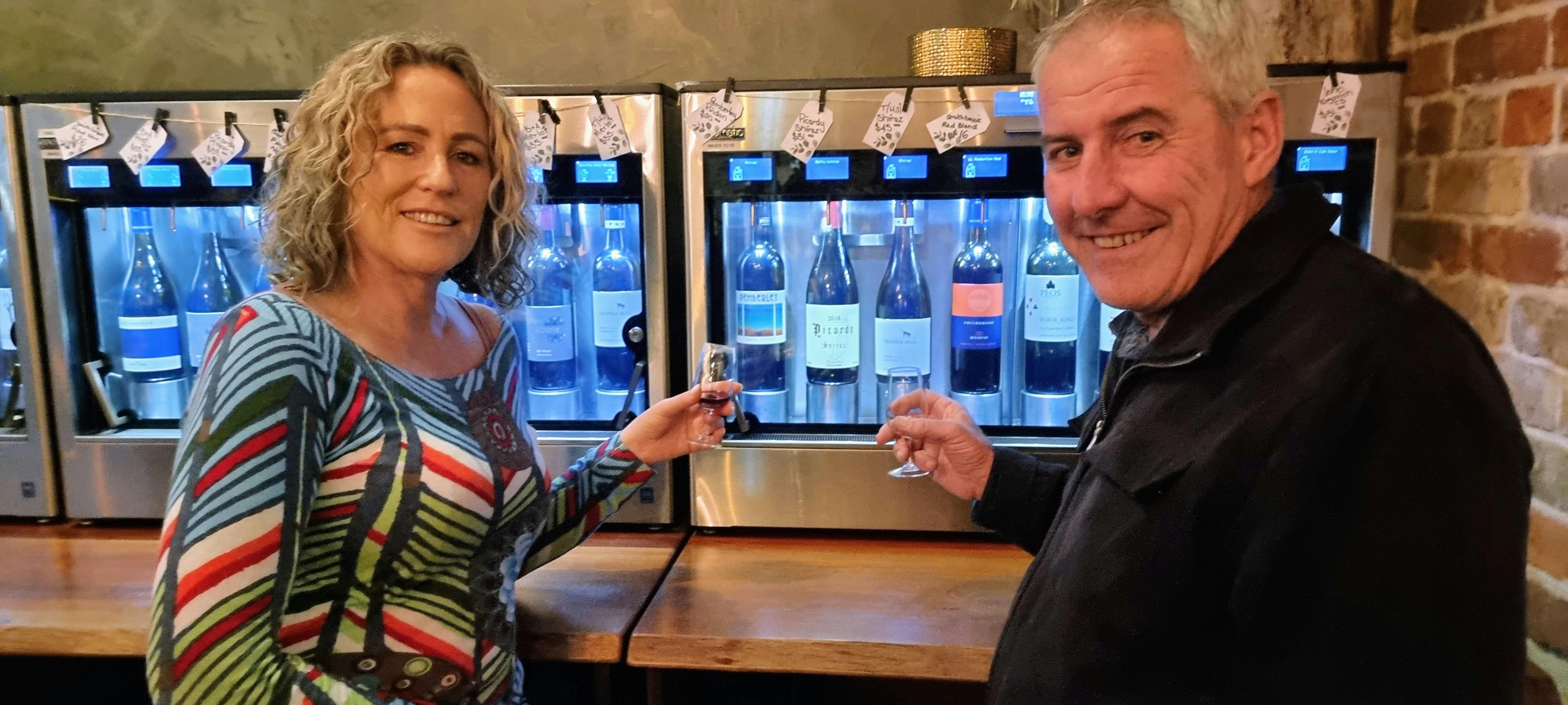 Tour Host Annette Porter and guide Peter Casonato at Tall Timbers Restaurant