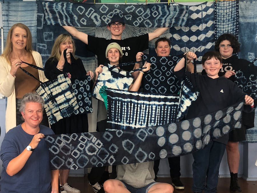 Kiama Art Workshops Shibori students with hand dyed scarves