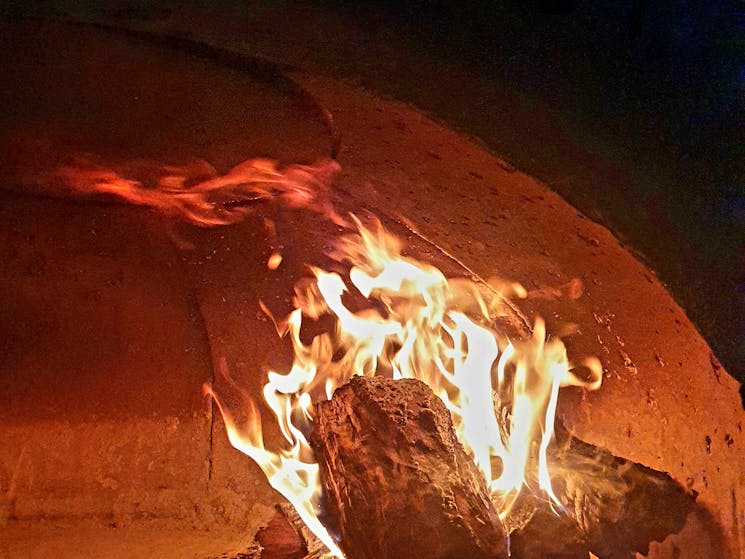 Flaming wood in a woodfired oven