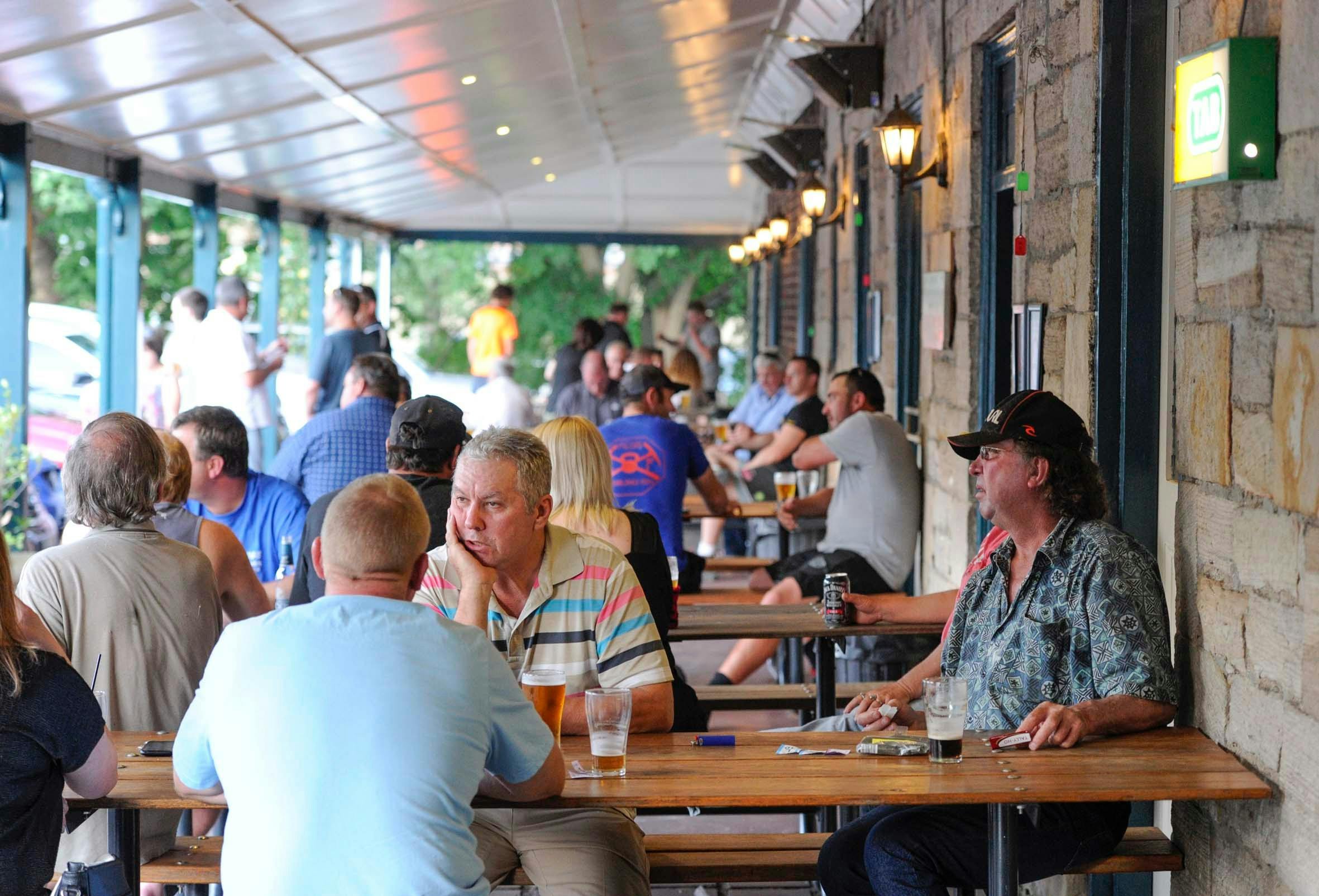 People enjoying lunch and drinks at the George IV Inn