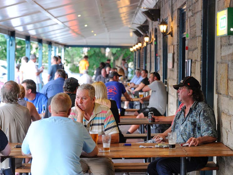 People enjoying lunch and drinks at the George IV Inn