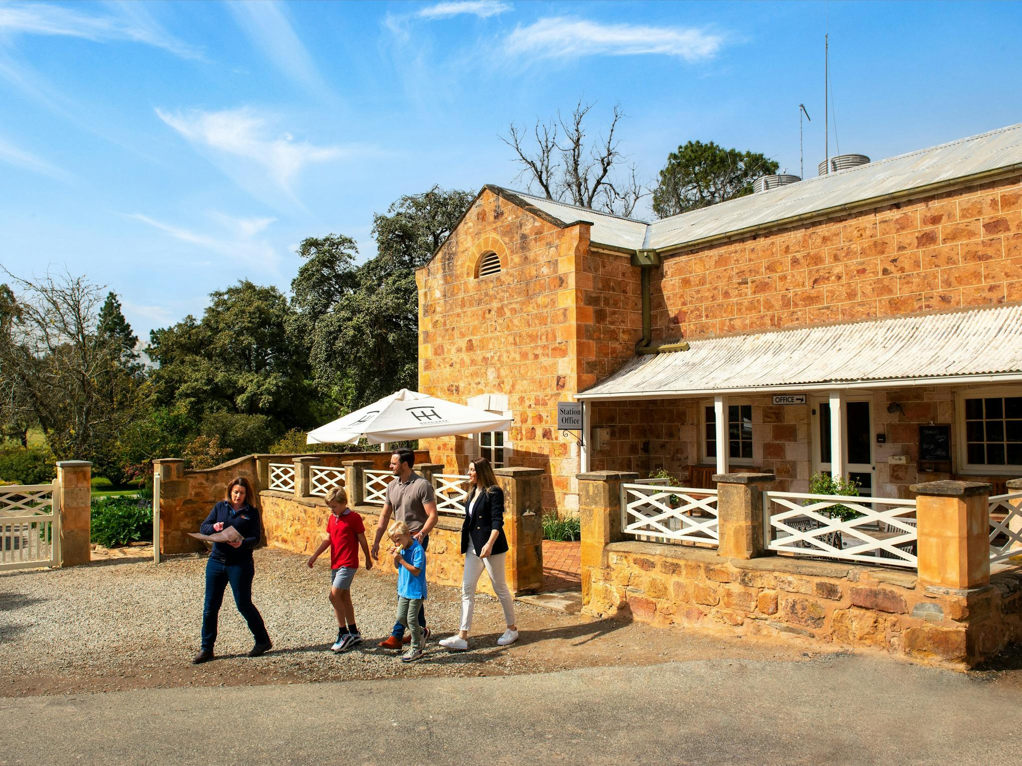 Family outside Bungaree's Station Store
