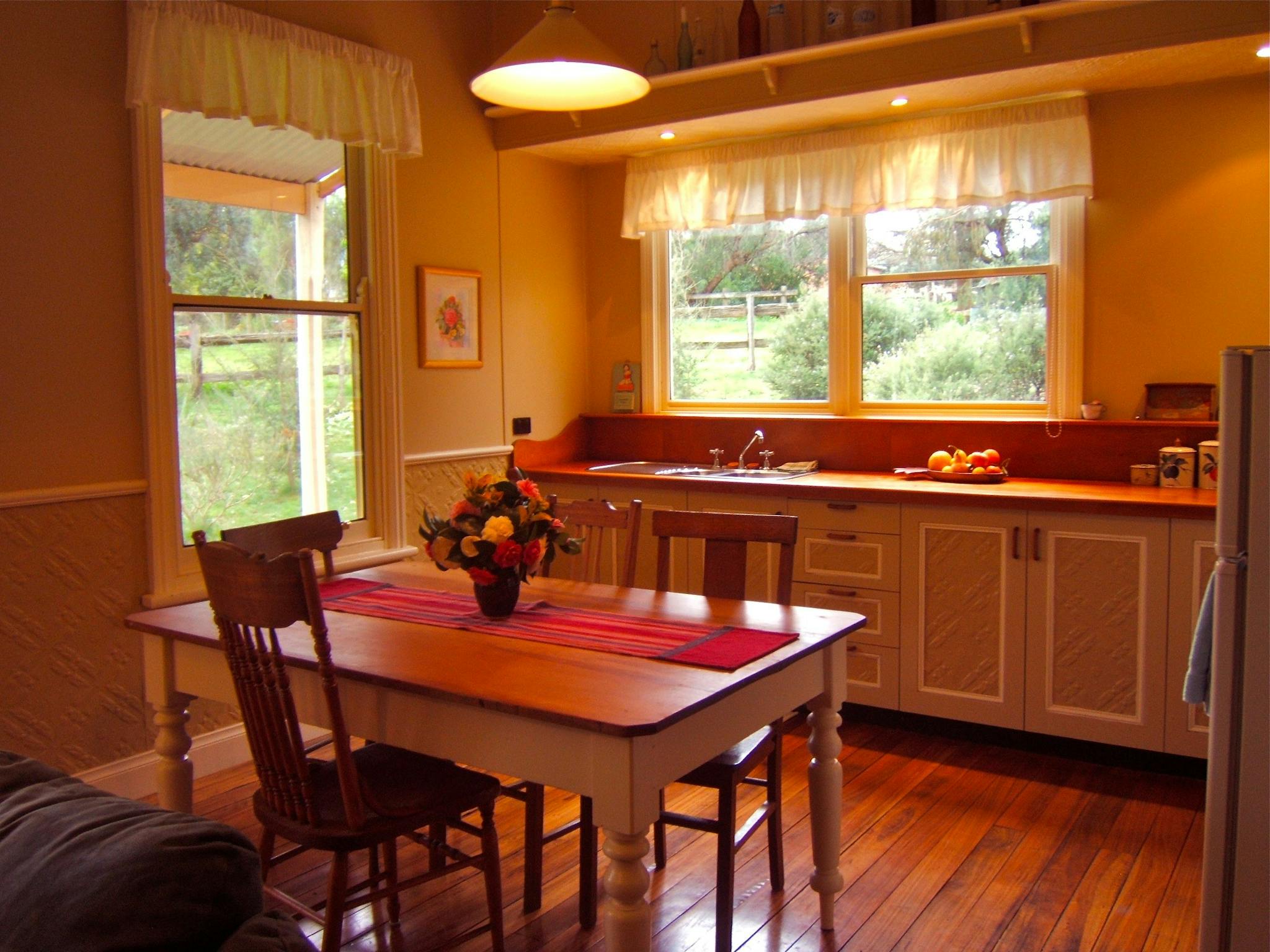 Lottie's has a full kitchen, warm timbers on the floor and comfy table chairs