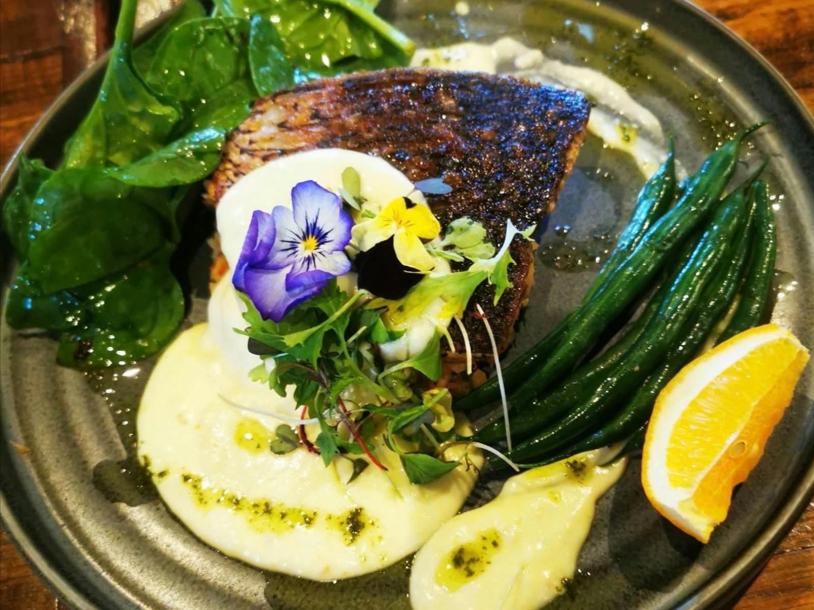 Barramundi with creamy mash and seasonal vegetables
