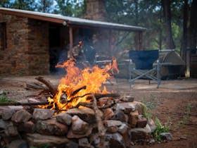 Blinman Hut with bon fire