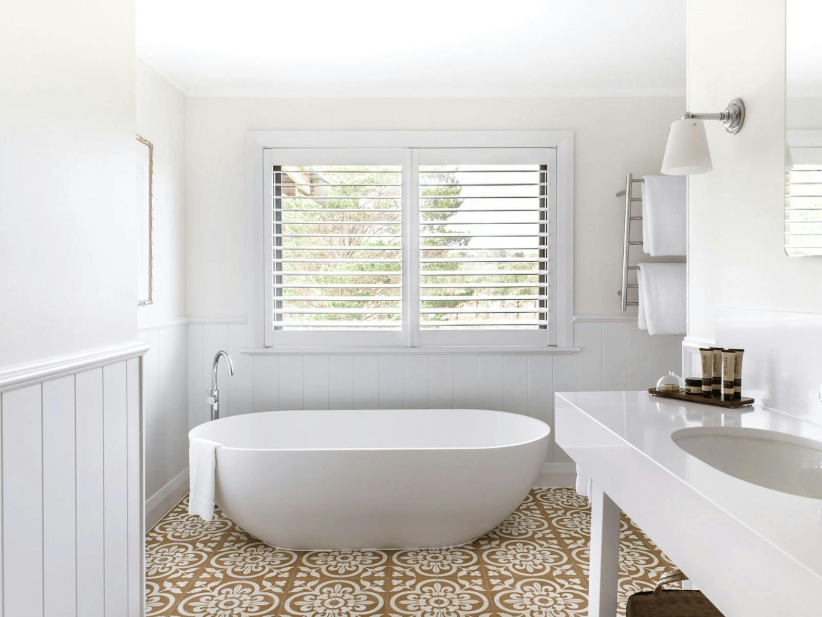 Studio Light-filled Bathroom with free standing bath