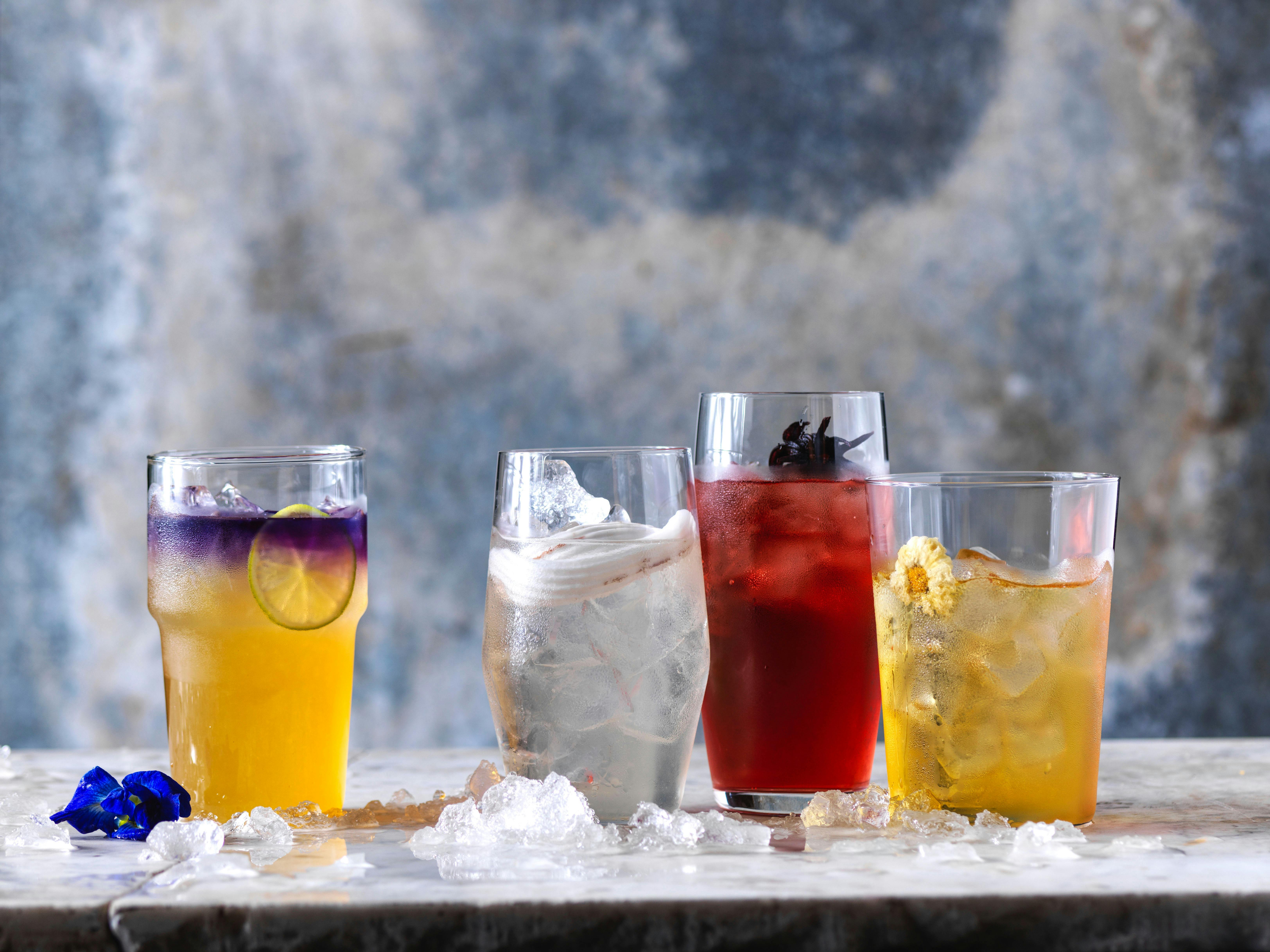 Butterfly Pea with Honey and Lemon, Fresh Coconut, Roselle Ice Tisane, Chrysanthemum Ice Tisane