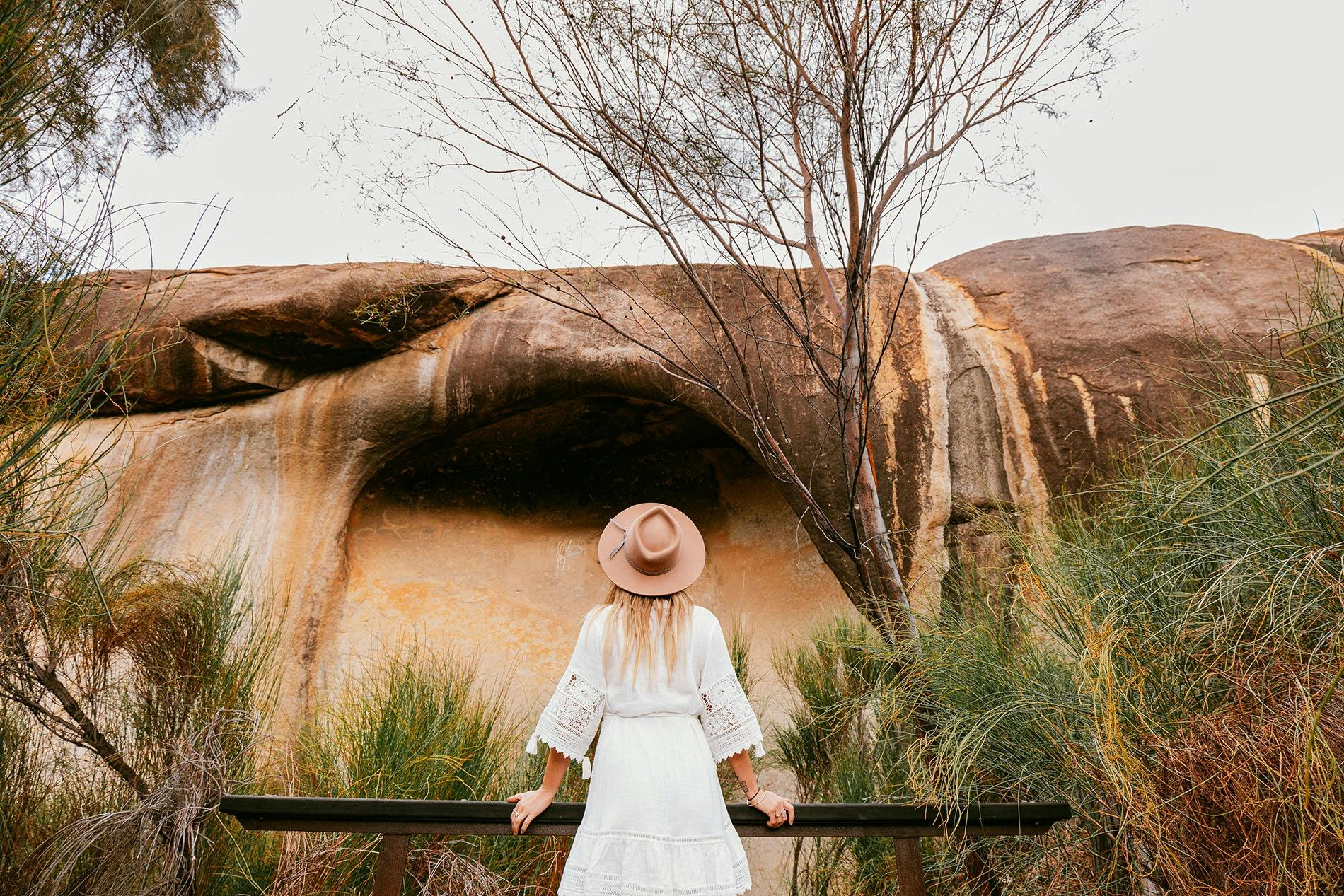 Lady viewing Kokerbin Rock near Quairading