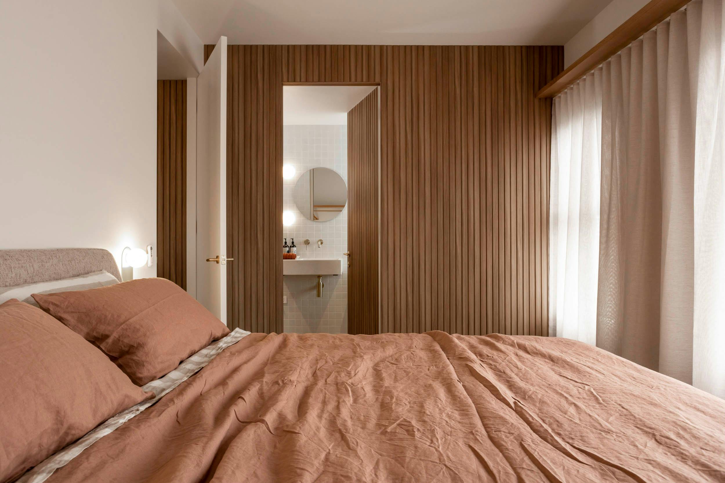 The master bedroom and glimpse of the en suite in Jane's