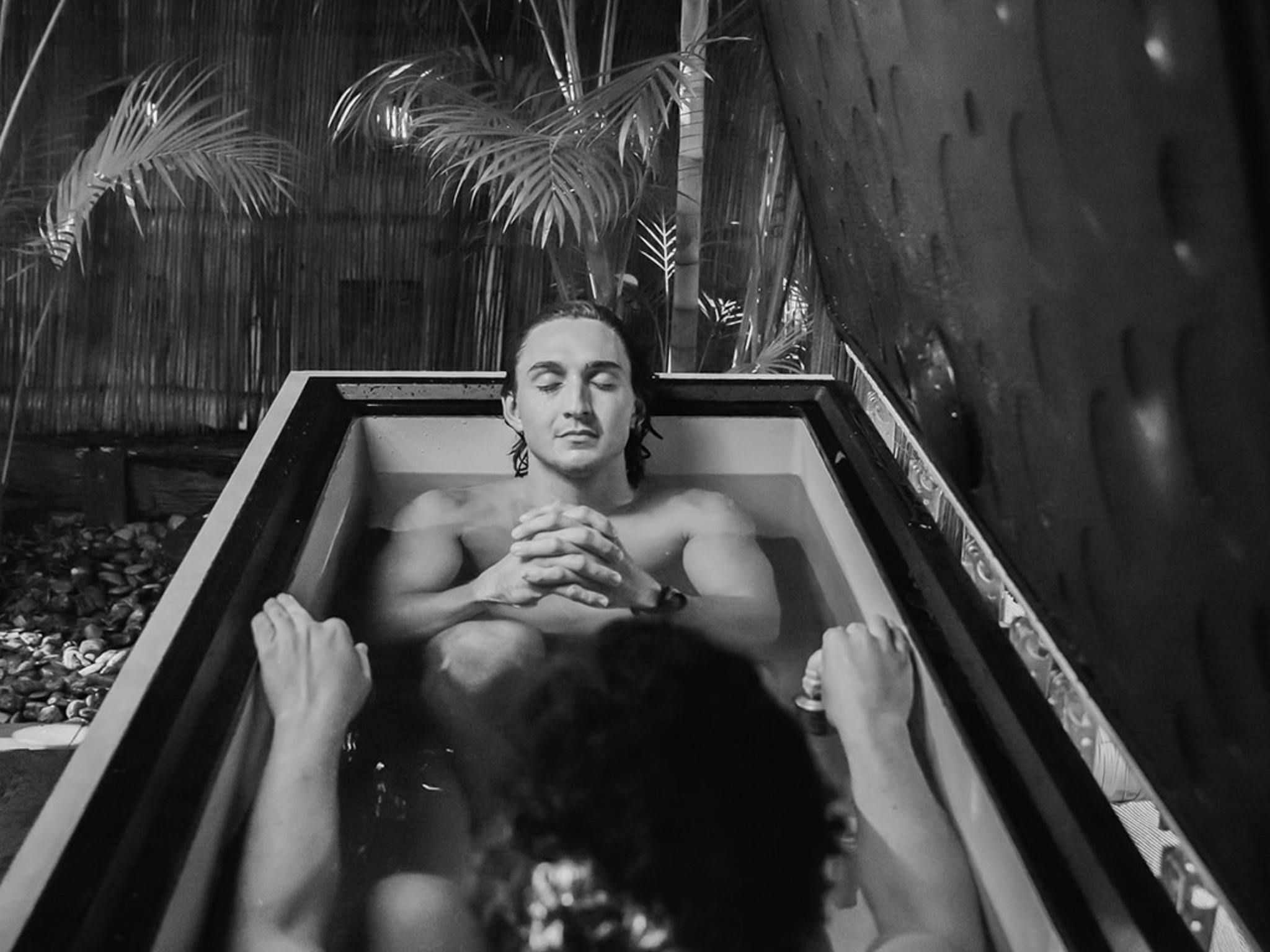2 people in ice bath 2 people in ice bath