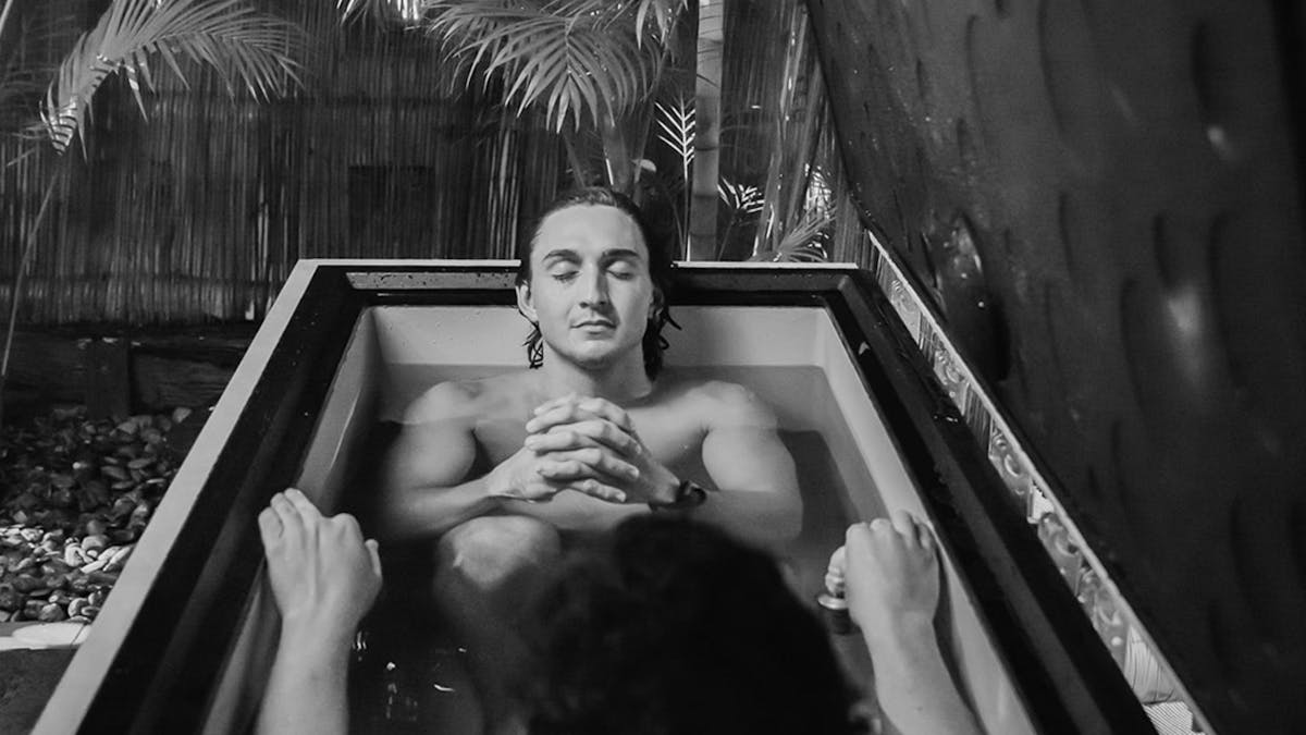 2 people in ice bath