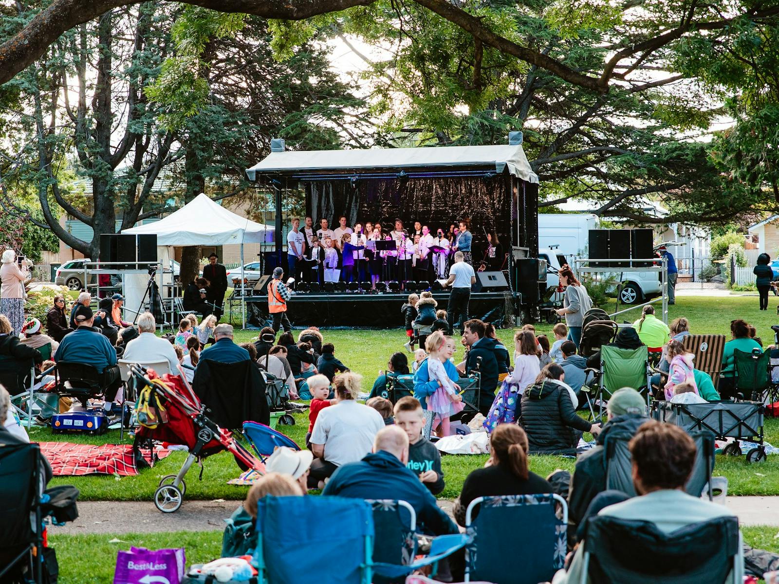 Stage and audience on lawn, 2022
