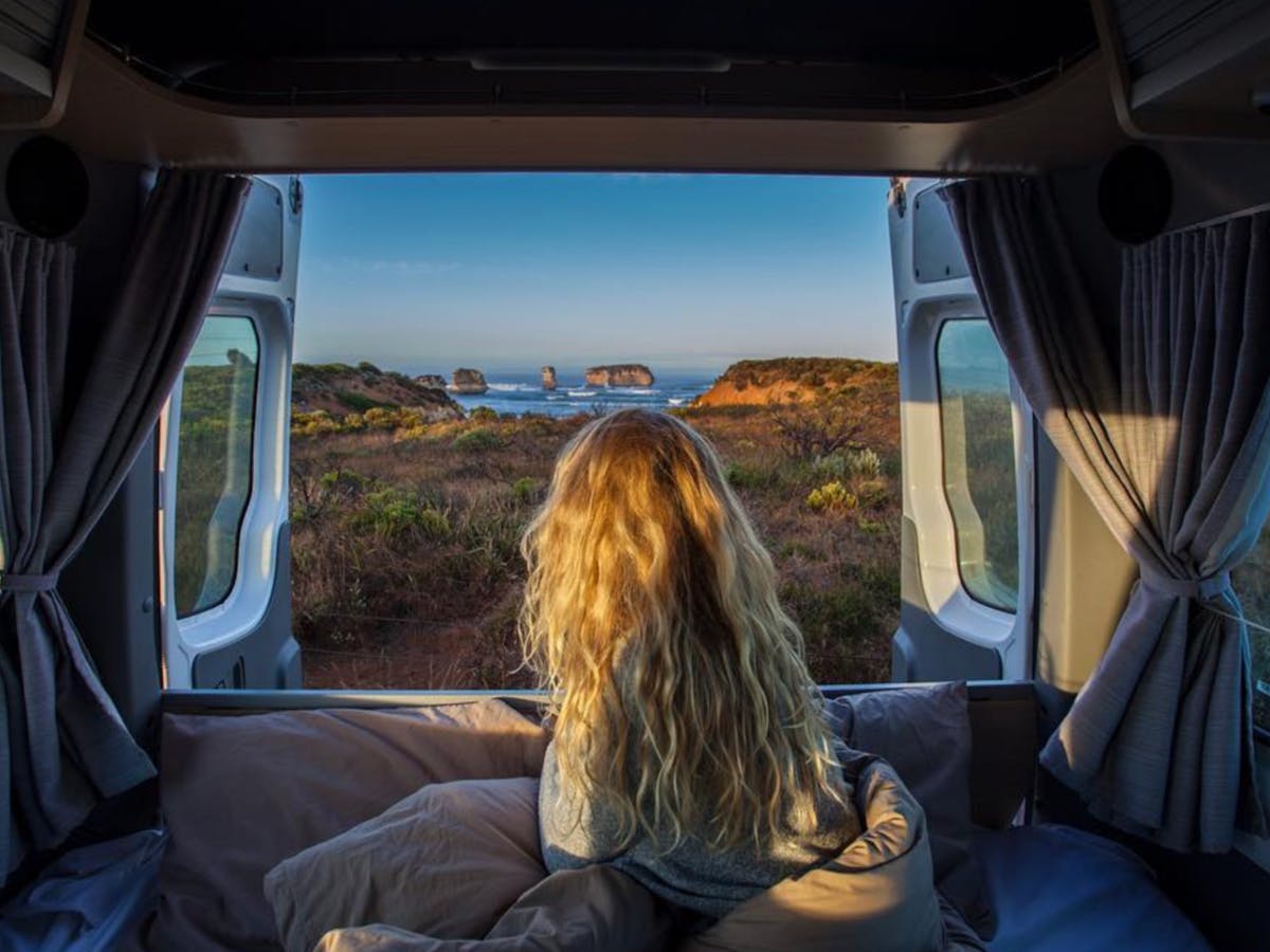 A customer admiring the Great Ocean Road views