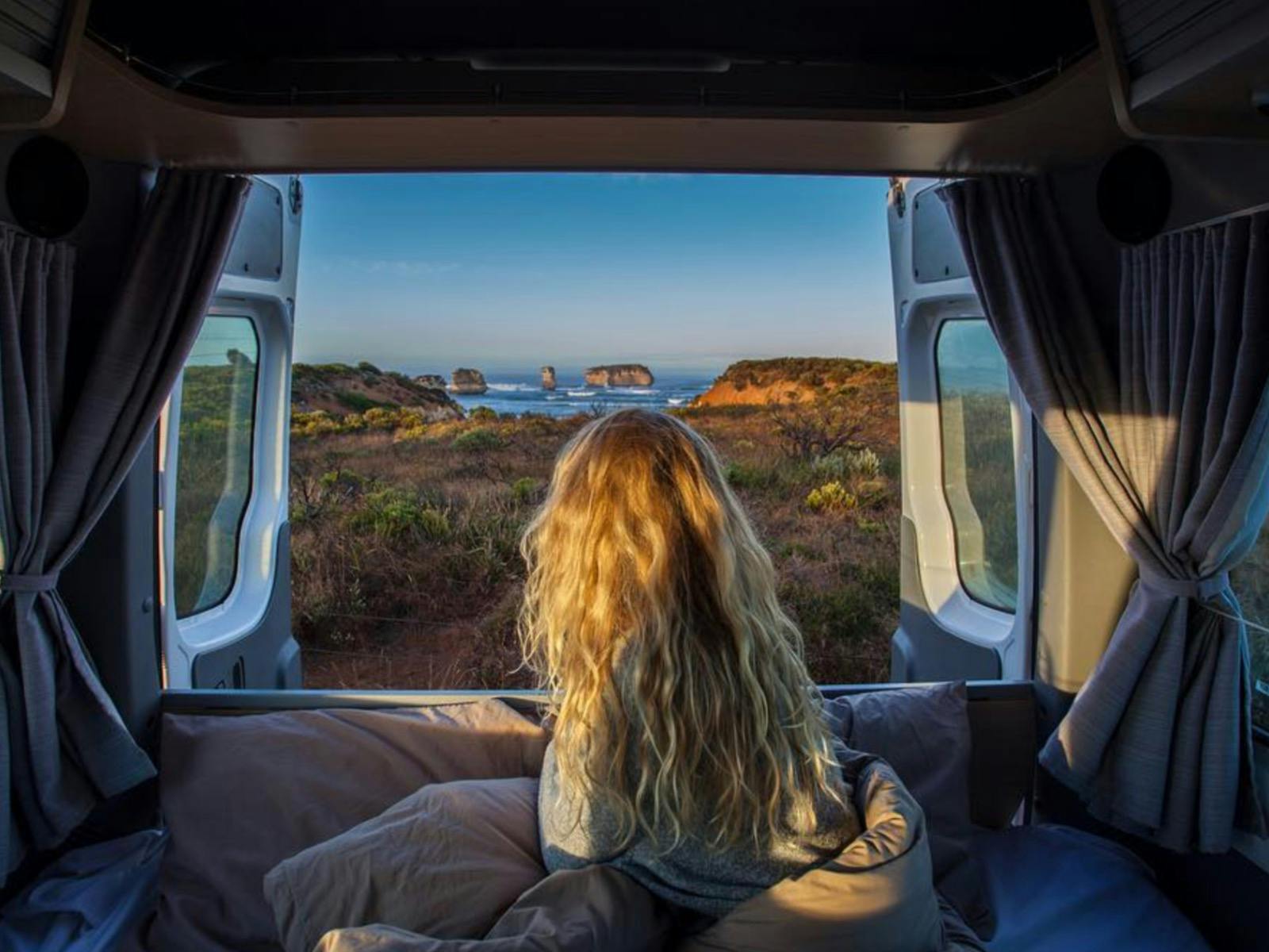 A customer admiring the Great Ocean Road views