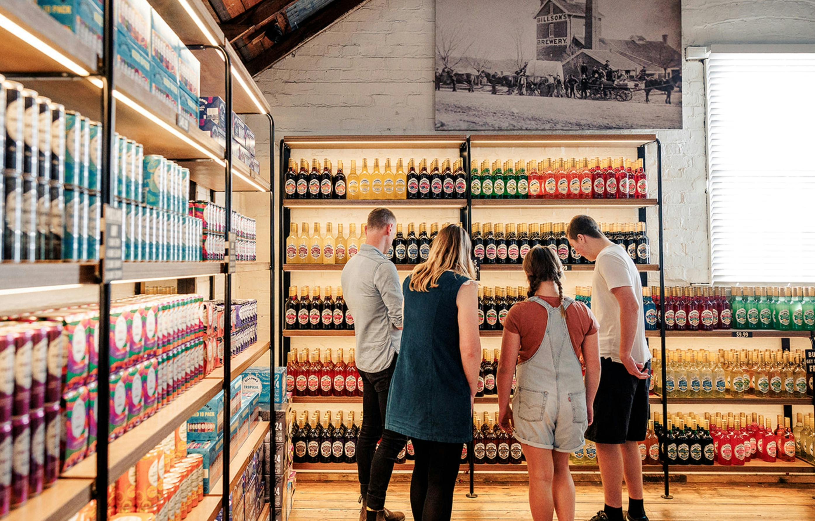 visitors looking at a range of bottles at Last St Brewery