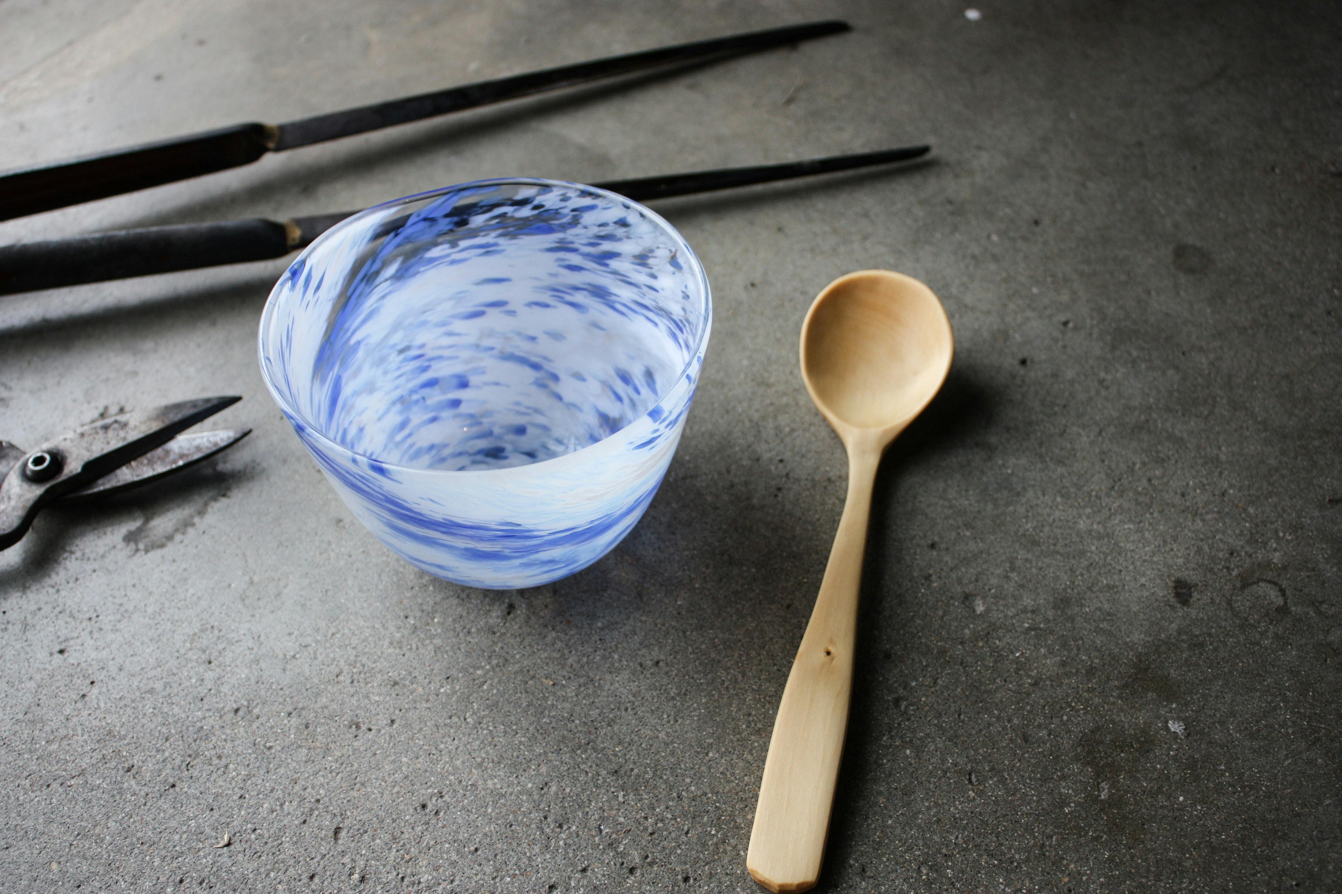 hand carved wooden spoon, and blown bowl