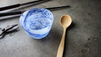 hand carved wooden spoon, and blown bowl