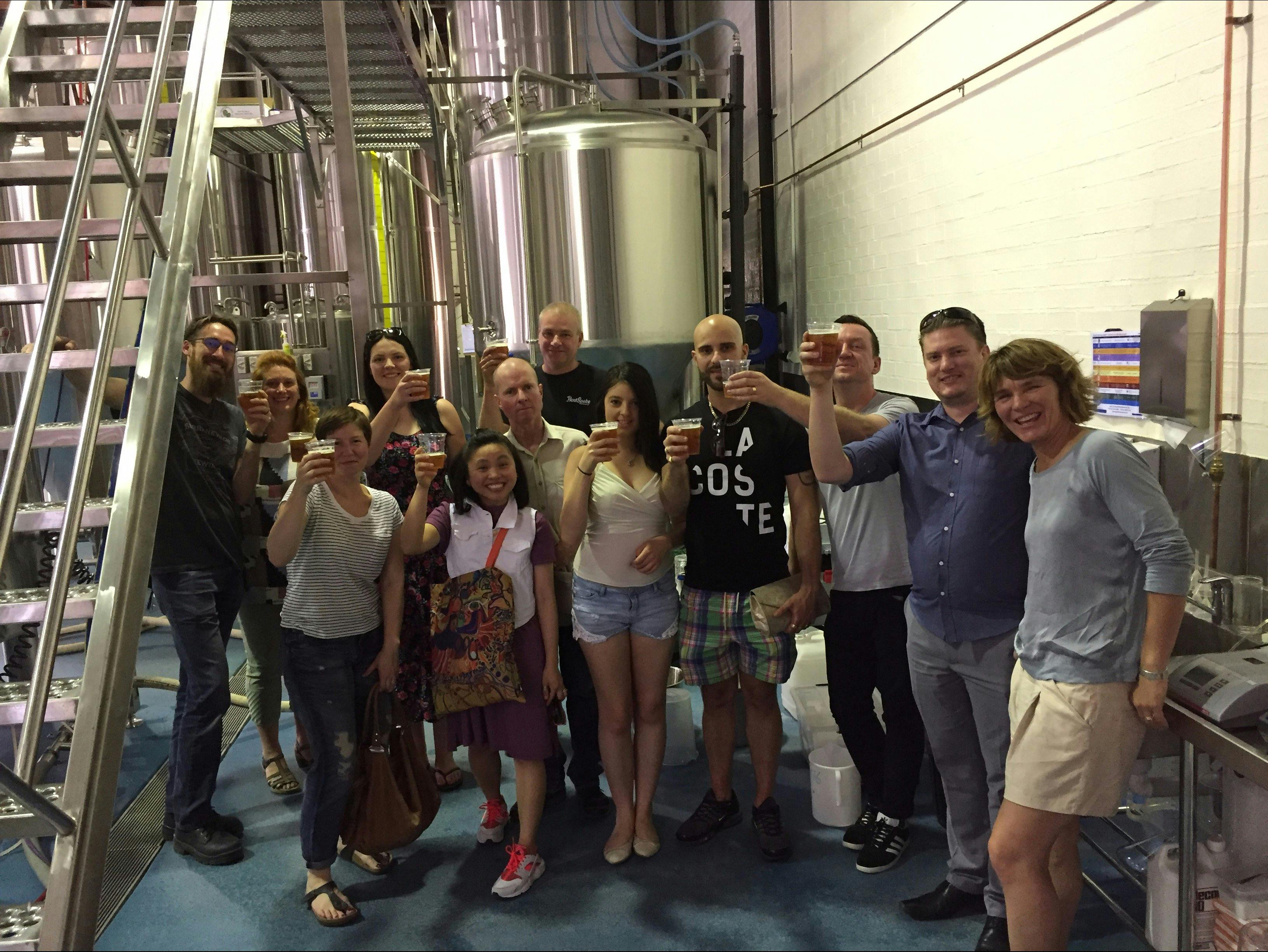 Tour group with beers in hand at the BentSpoke Cannery