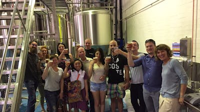 Tour group with beers in hand at the BentSpoke Cannery