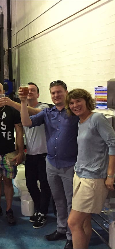 Tour group with beers in hand at the BentSpoke Cannery