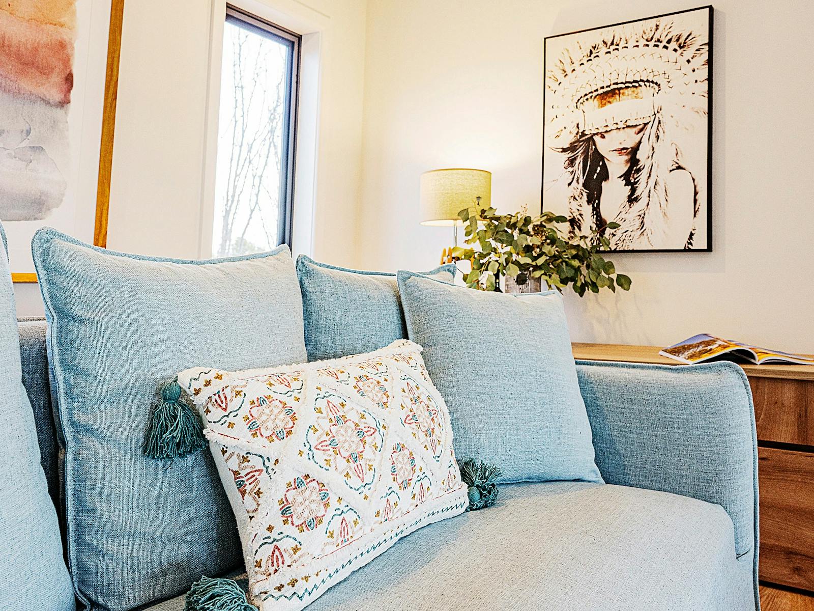 living room with a pastel blue couch