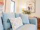 living room with a pastel blue couch