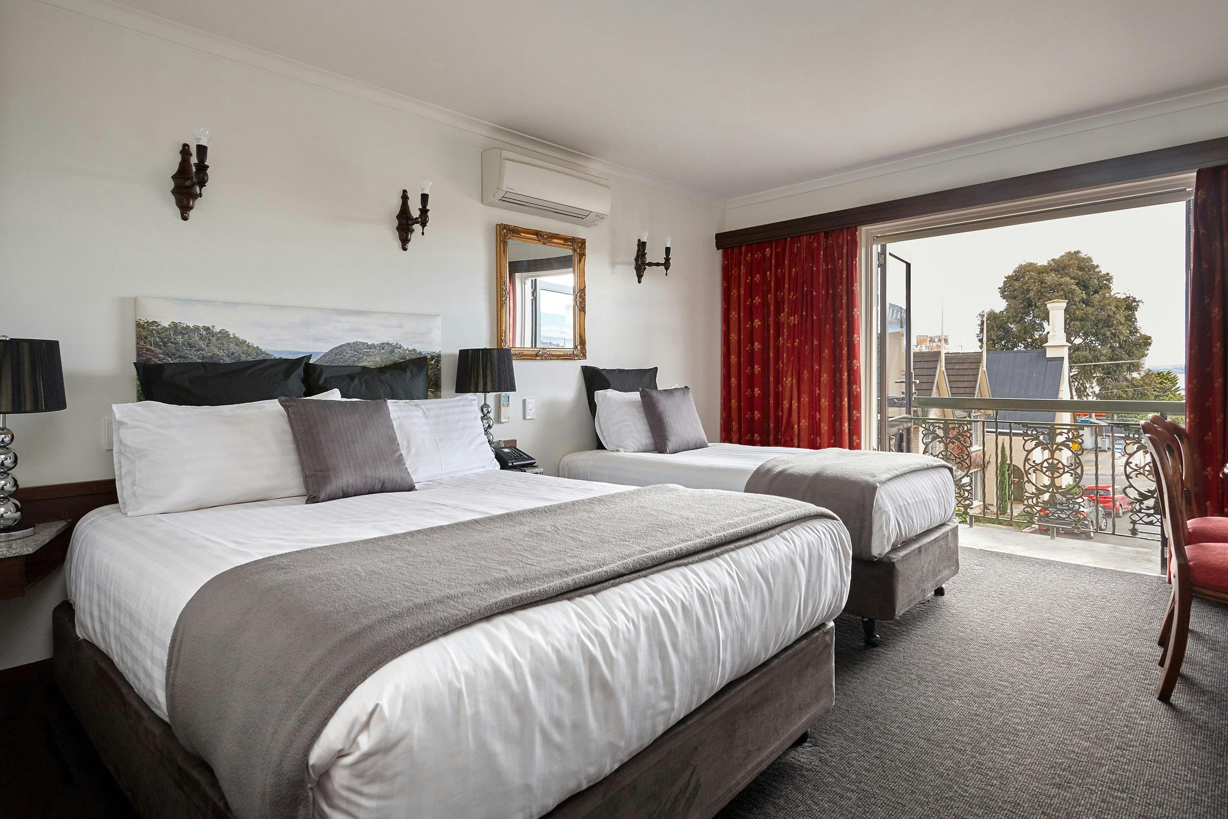 one queen bed, one single bed with ensuite bathroom