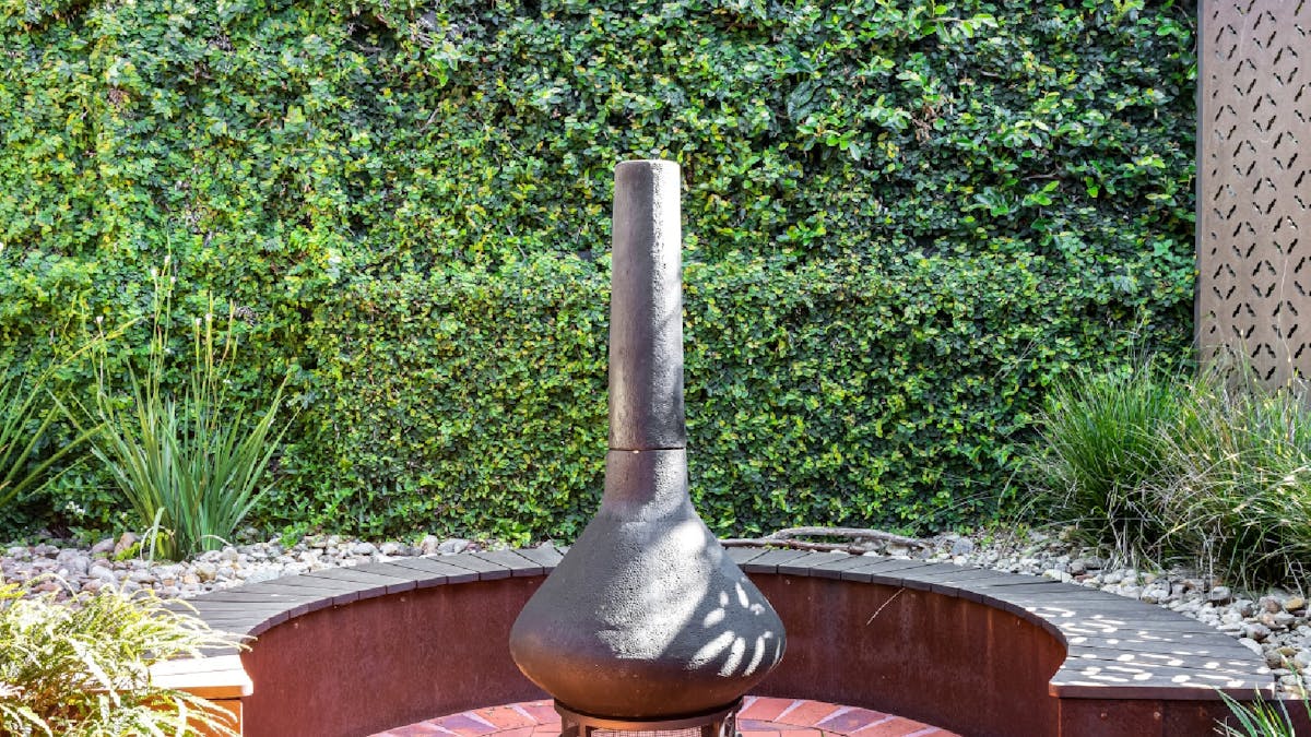 Outdoor fireplace and sitting area