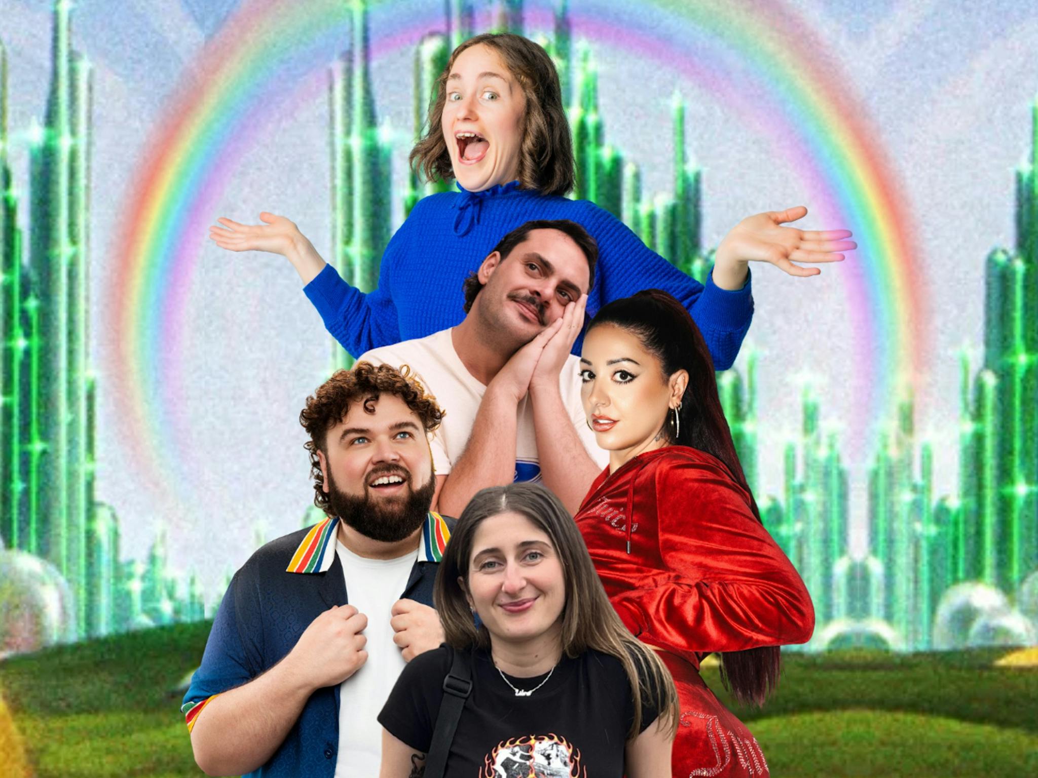 Five people gathered under a rainbow arc. The background is full of emerald towers.
