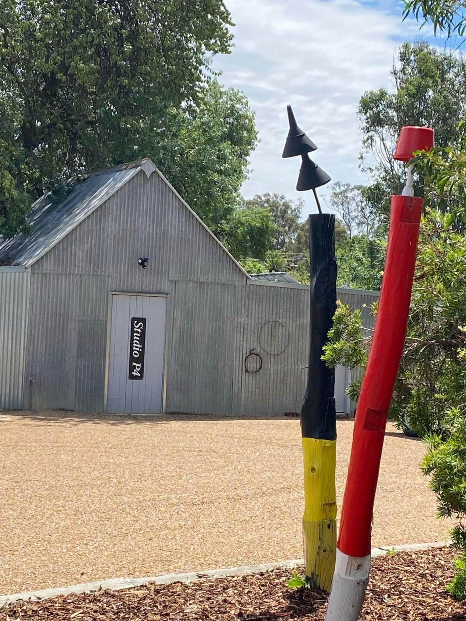 the gallery has a rustic feel about it and there is a second stuido which has a sign on it