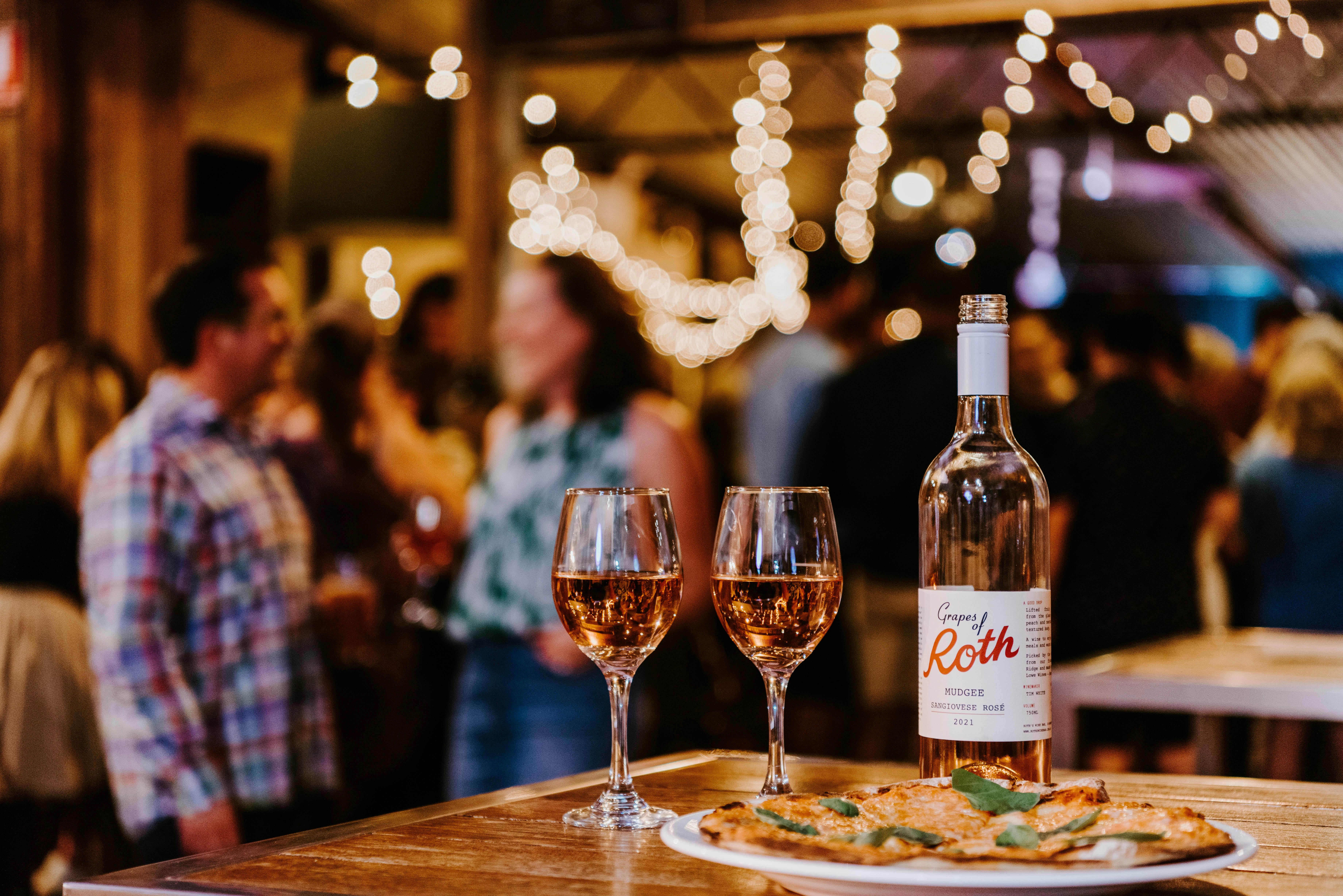 Our house label Grapes of Roth Sangiovese Rose paired with our famous wood-fired pizza (Margherita)