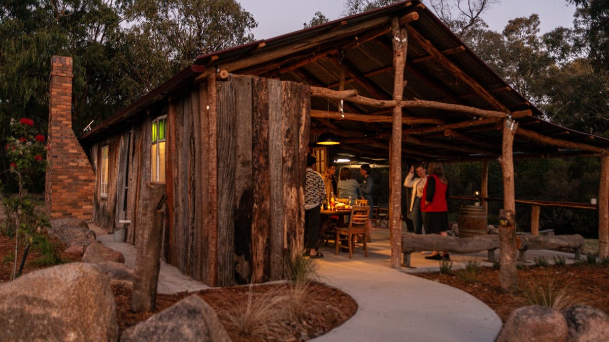 timber hut structure with bbq, fireplace and more