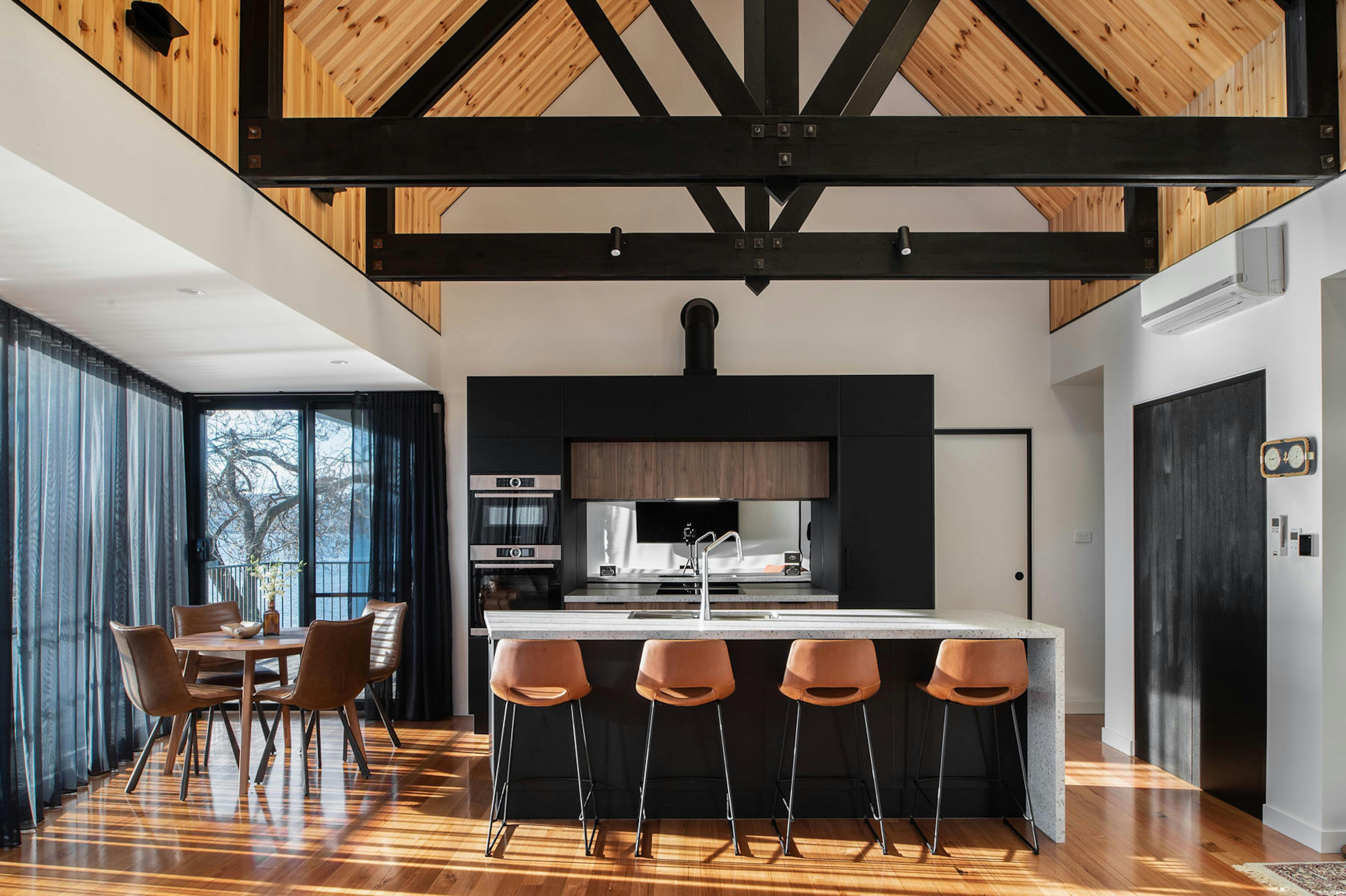 The heart of the cabin is the central open plan kitchen, dining and living area