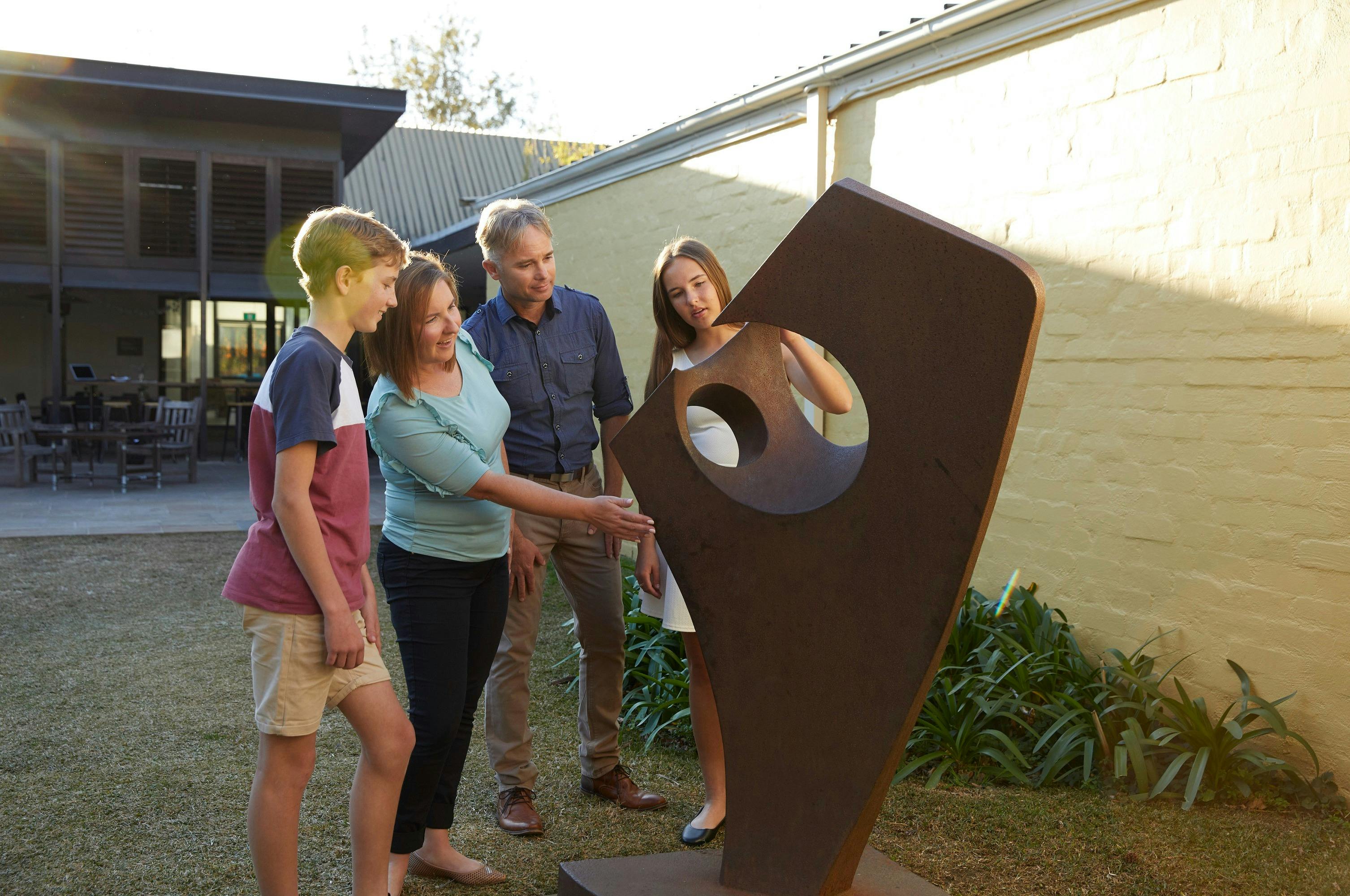 Family enjoying the art exhibition at the Penrith Regional Gallery in Western Sydney