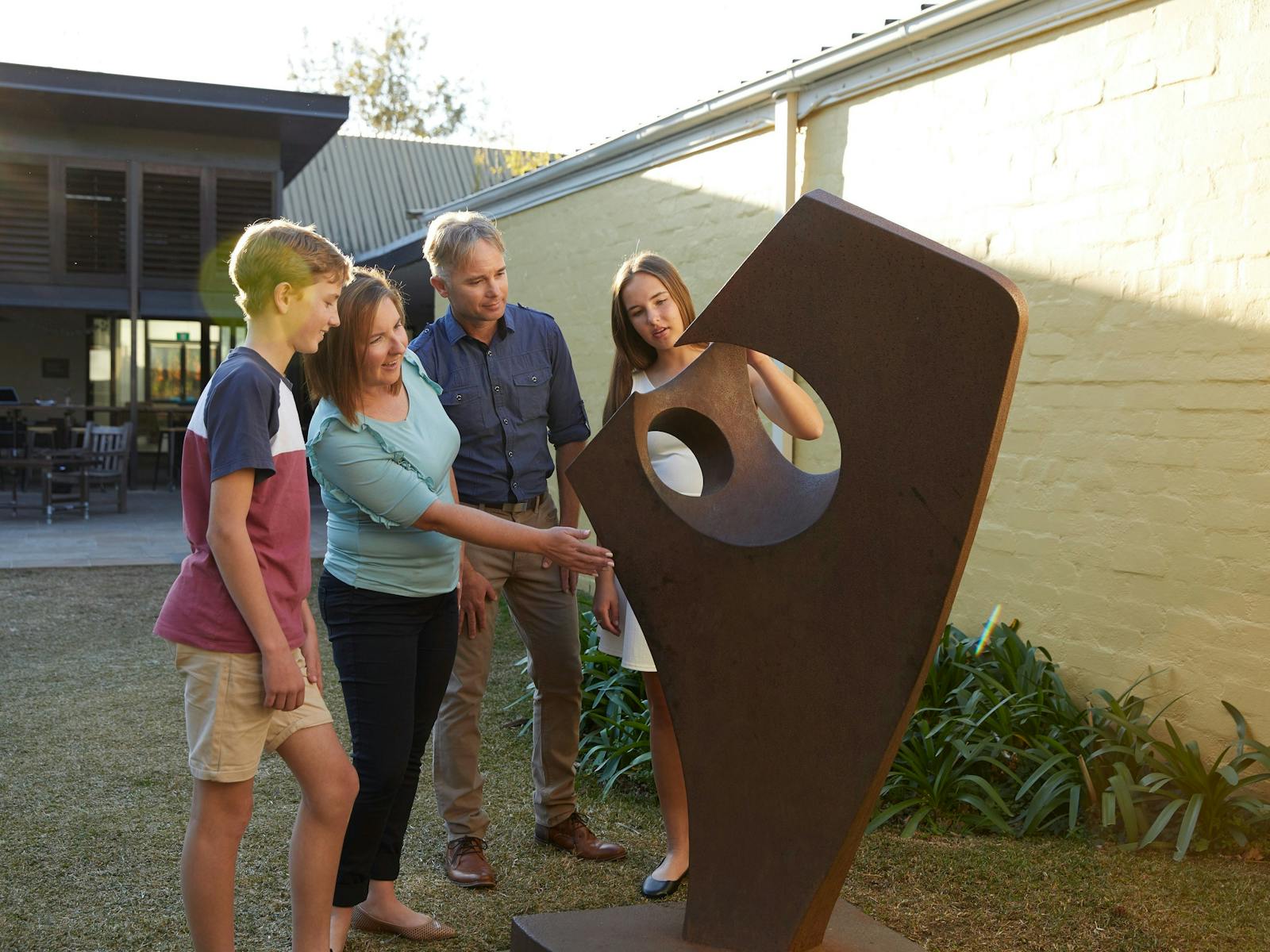 Family enjoying the art exhibition at the Penrith Regional Gallery in Western Sydney
