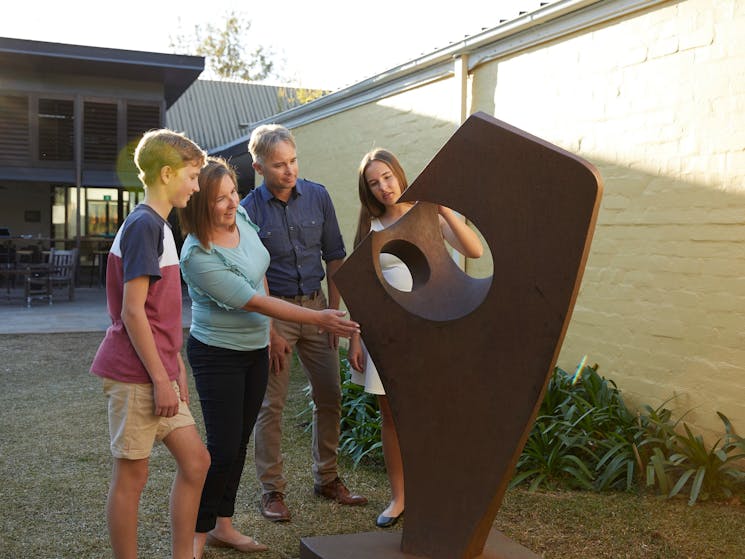 Family enjoying the art exhibition at the Penrith Regional Gallery in Western Sydney