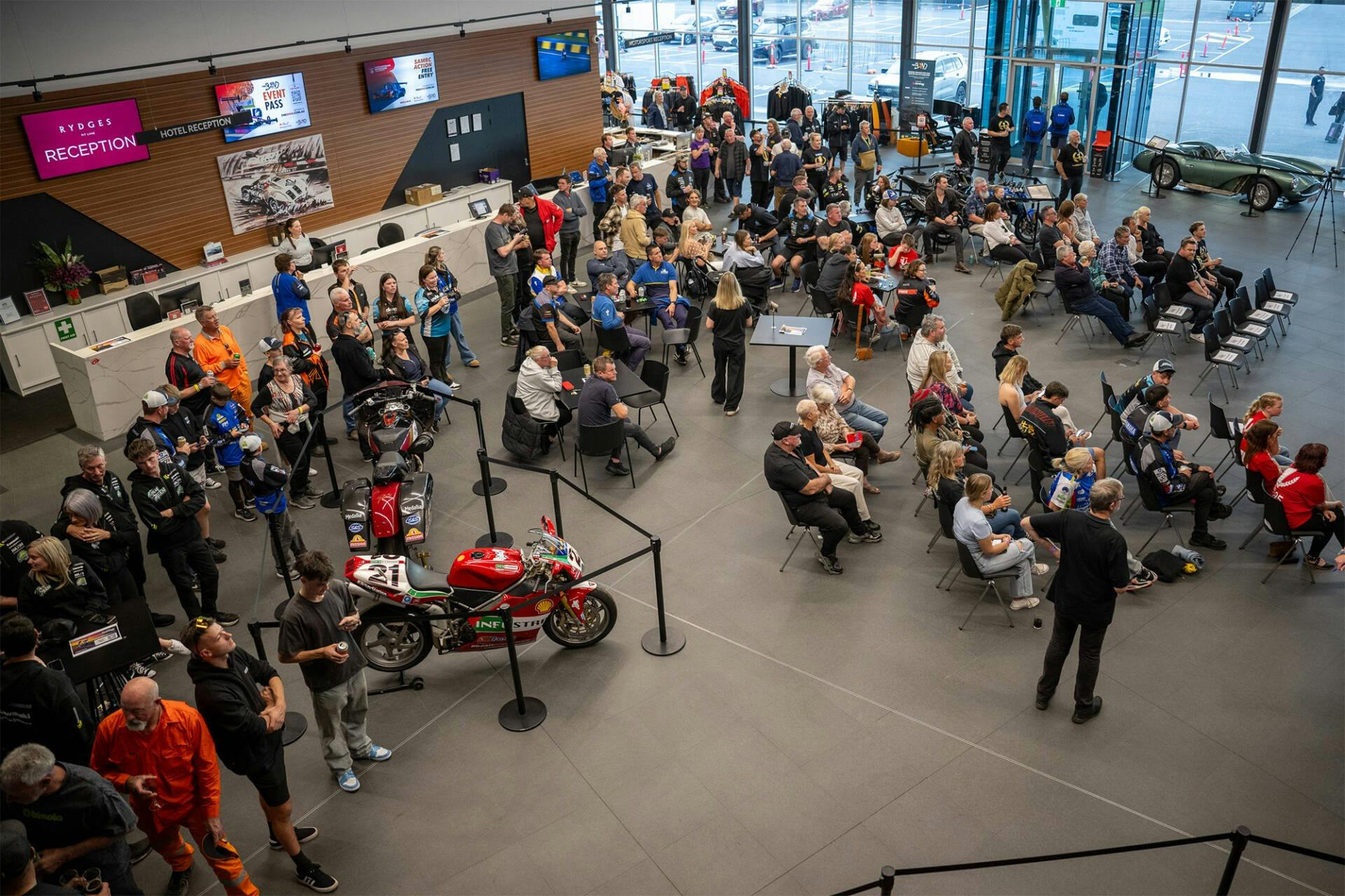 A crowd gathers for a press conference