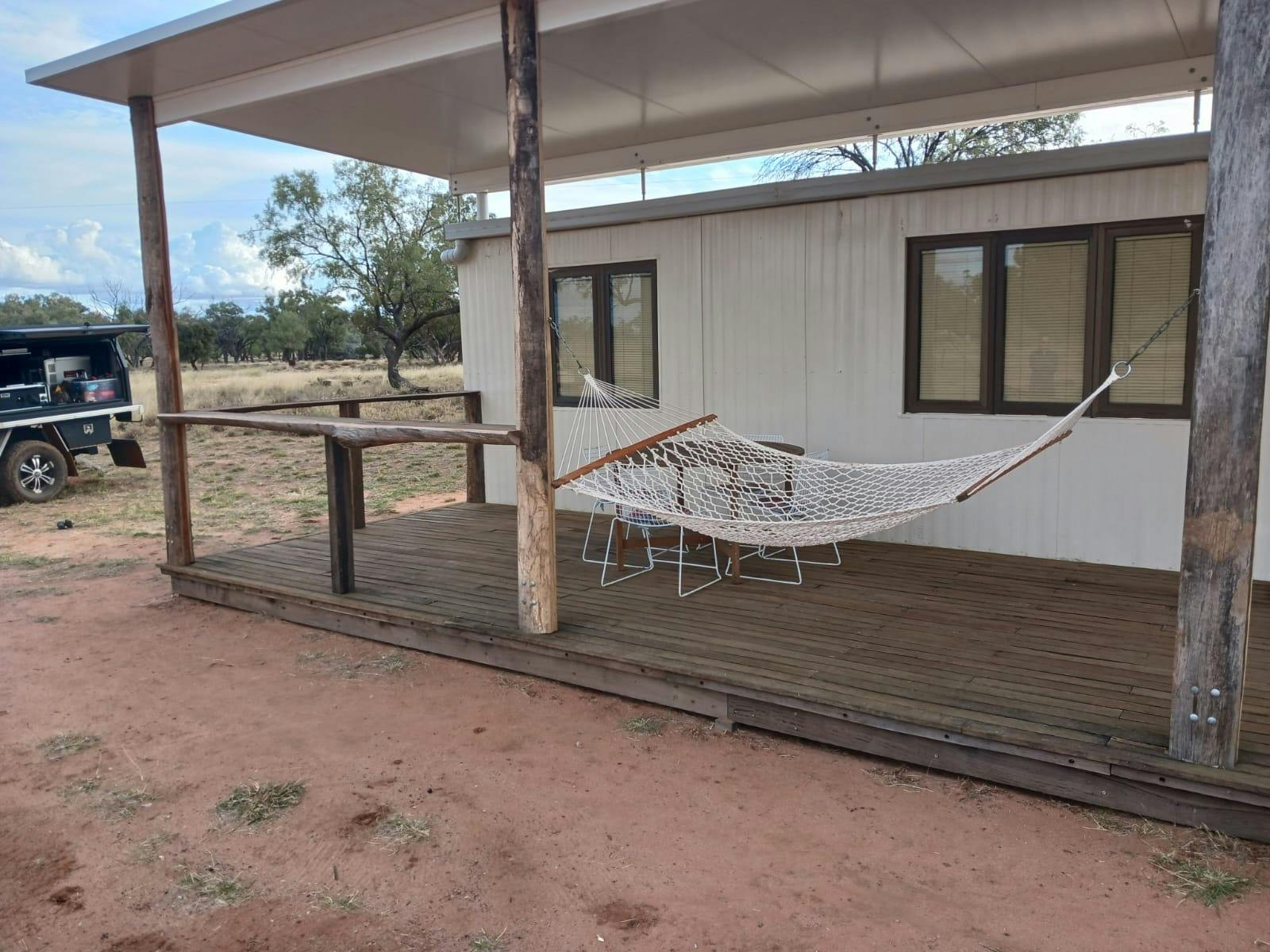 Hammock and deck of Merino Cabin, Charlotte Plains, Outback Queensland