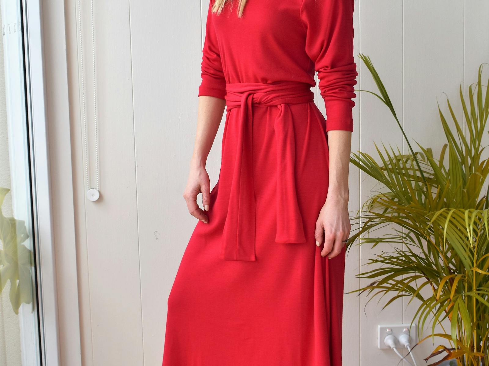 Woman in red wool dress