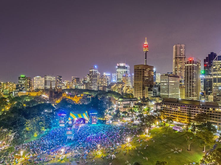 Crowds enjoying a concert at the Domain