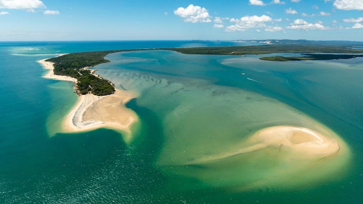 View the amazing colours and shape of Inskip Peninsula, spot the reforming historical sink holes View the amazing colours and shape of Inskip Peninsula, spot the reforming historical sink holes