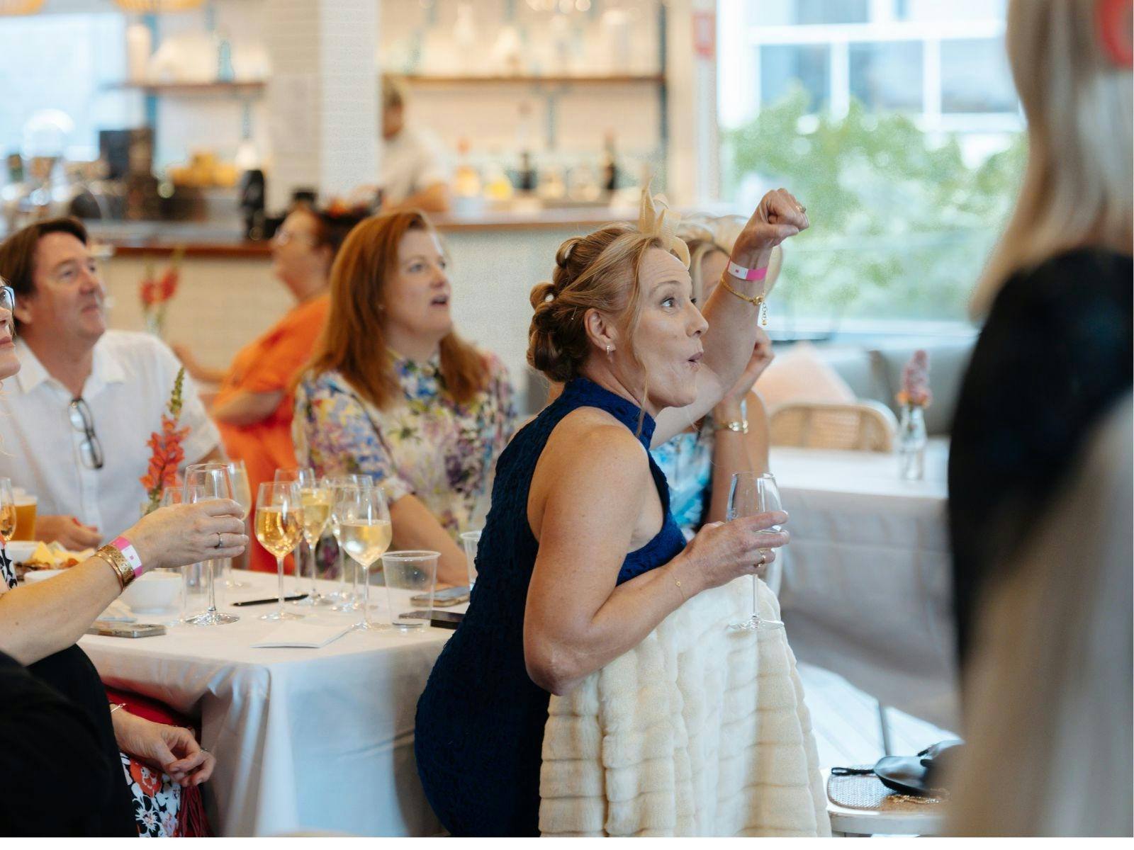 Guests watching Melbourne Cup racing over lunch and drinks at Towradgi Beach Hotel.