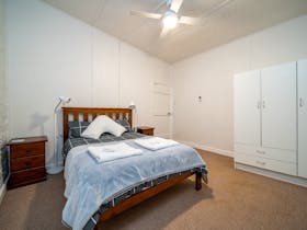 Bedroom 1 features a Queen bed