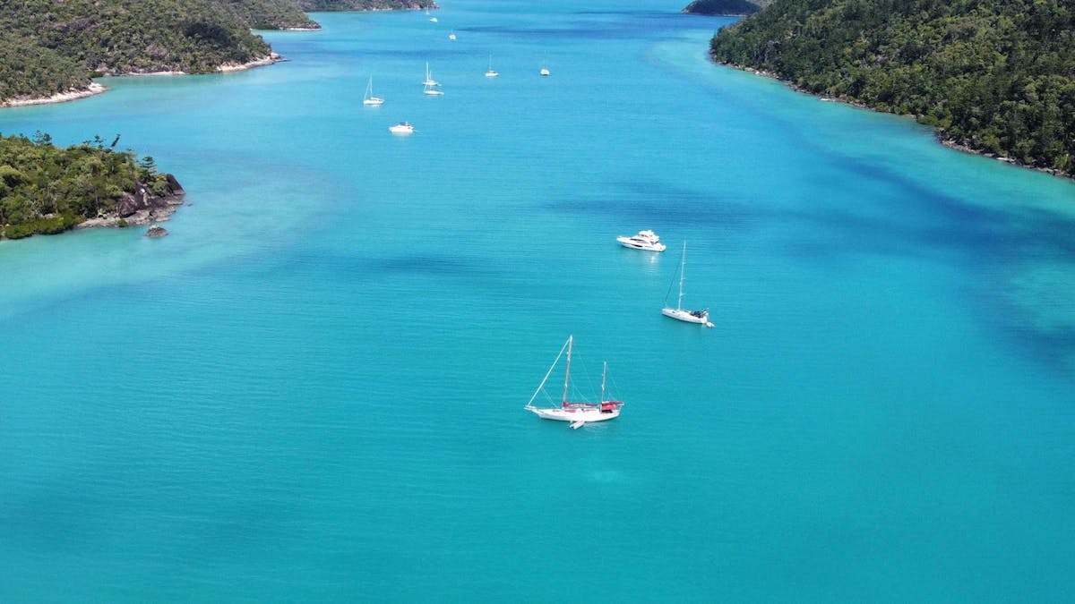 Lady Enid yacht anchored in Nara Inlet on Hook Island, Whitsundays